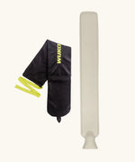 Wuka wearable hot water bottle to relieve period pains. A rubber bottle with a soft black fleece sleeve