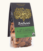 Side of the 150g pack of Zaytoun raw almonds presented in a bag with a decorated black and green packaging
